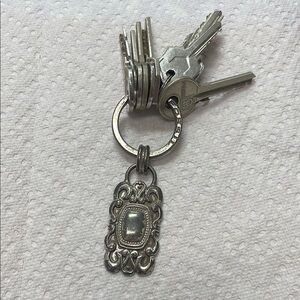 Fossil Silver Keychain with Ornate Pendant